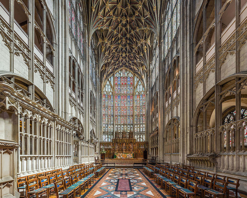 Gloucester Cathedral - The soaring stained glass windows behind the high altar. Credit: David Iliff