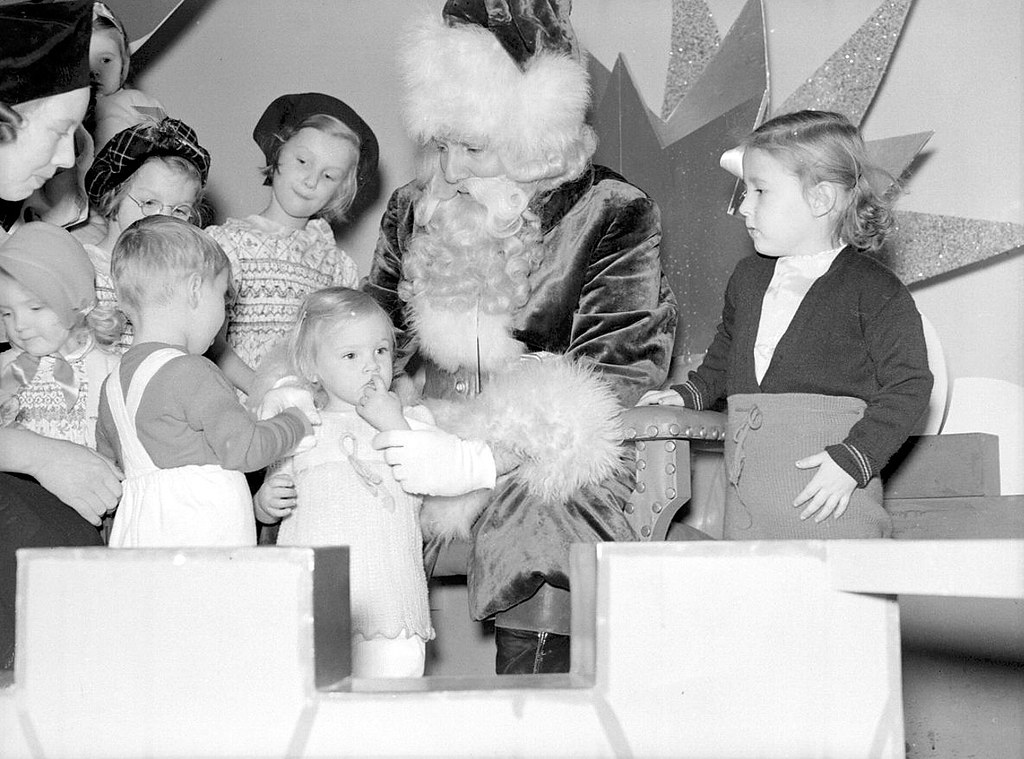 Children visiting Santa Claus, Eaton's department store, St. Catherine Street, Montreal, Canada, 1941