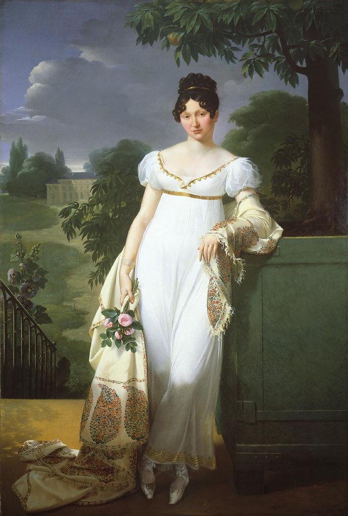 French lady in 1808. The style was often accompanied by a shawl or similar wrap, or a short 'Spencer' jacket, as the dresses were light and left much uncovered.