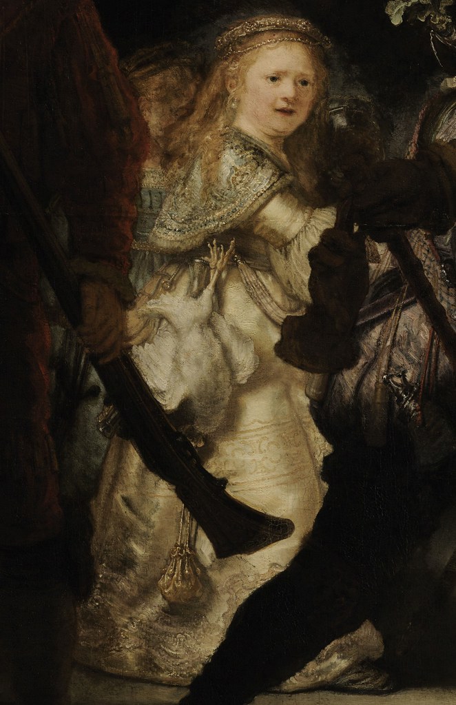 The girl mascot carrying symbols of the Amsterdam Militia