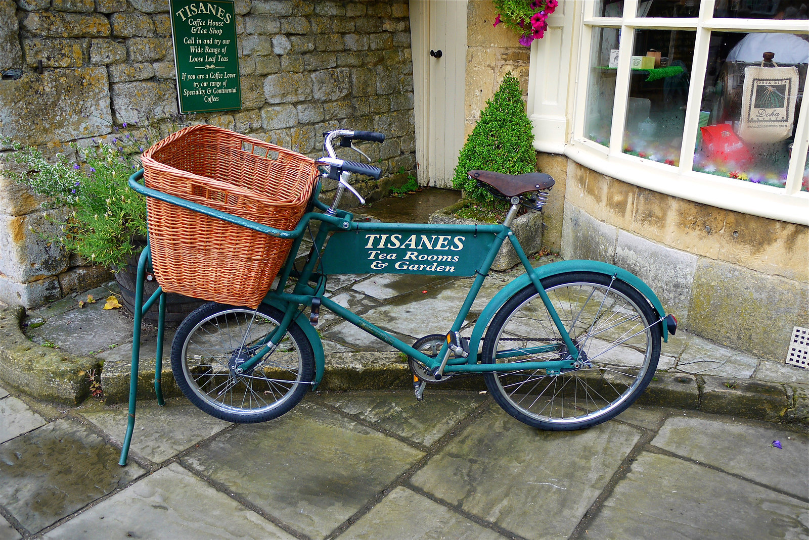 Delivery bicycle at Tisanes Tea Room in Broadway, Worcestershire. Credit Mick