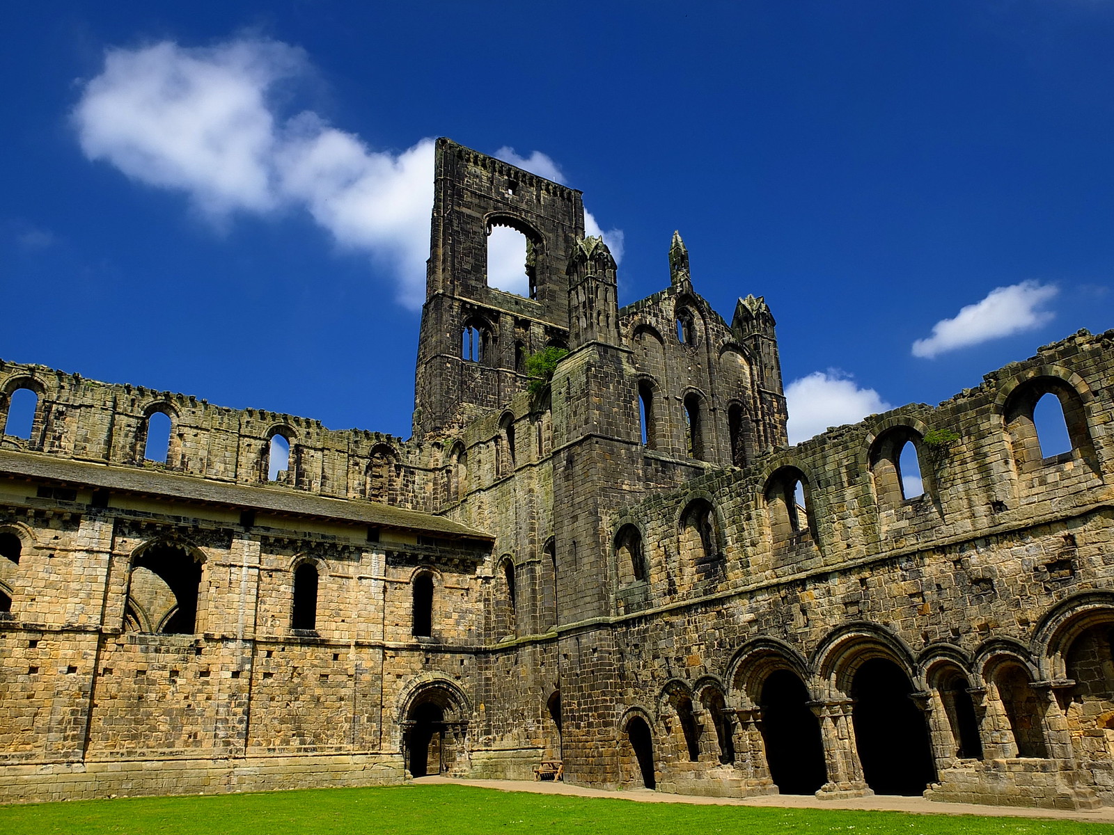 Kirkstall Abbey cloisters. Credit Sireuk
