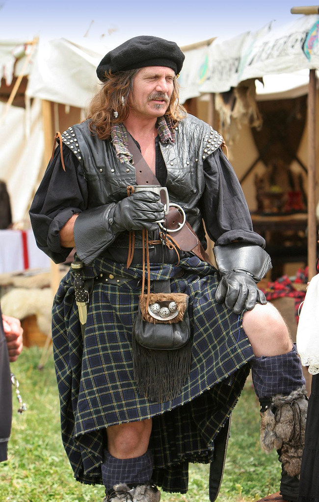 A belted plaid with sporran as worn by a reenactor of Scottish history.