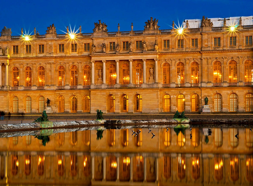 Château de Versailles at night. Credit Romaric Juvanon
