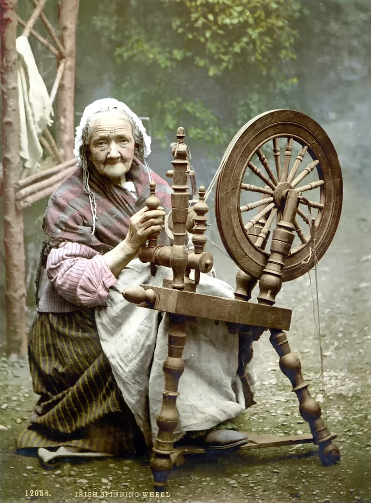 Irish spinner and spinning wheel. County Galway, Ireland