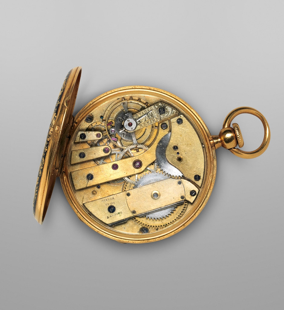 1850. Watch. Swiss, Geneva. Case partly enameled gold; Dial white enamel with gold hands; Movement gilded brass and steel. metmuseum