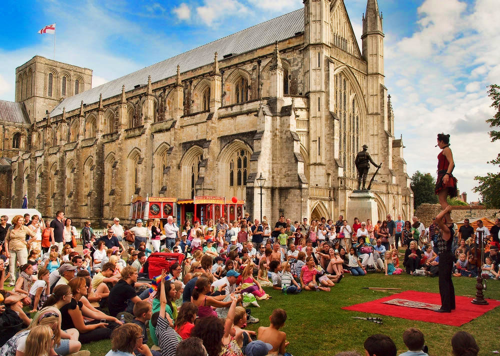 Entertainers in the Close of the 11th century Cathedral. Credit Anguskirk, flickr, flickr