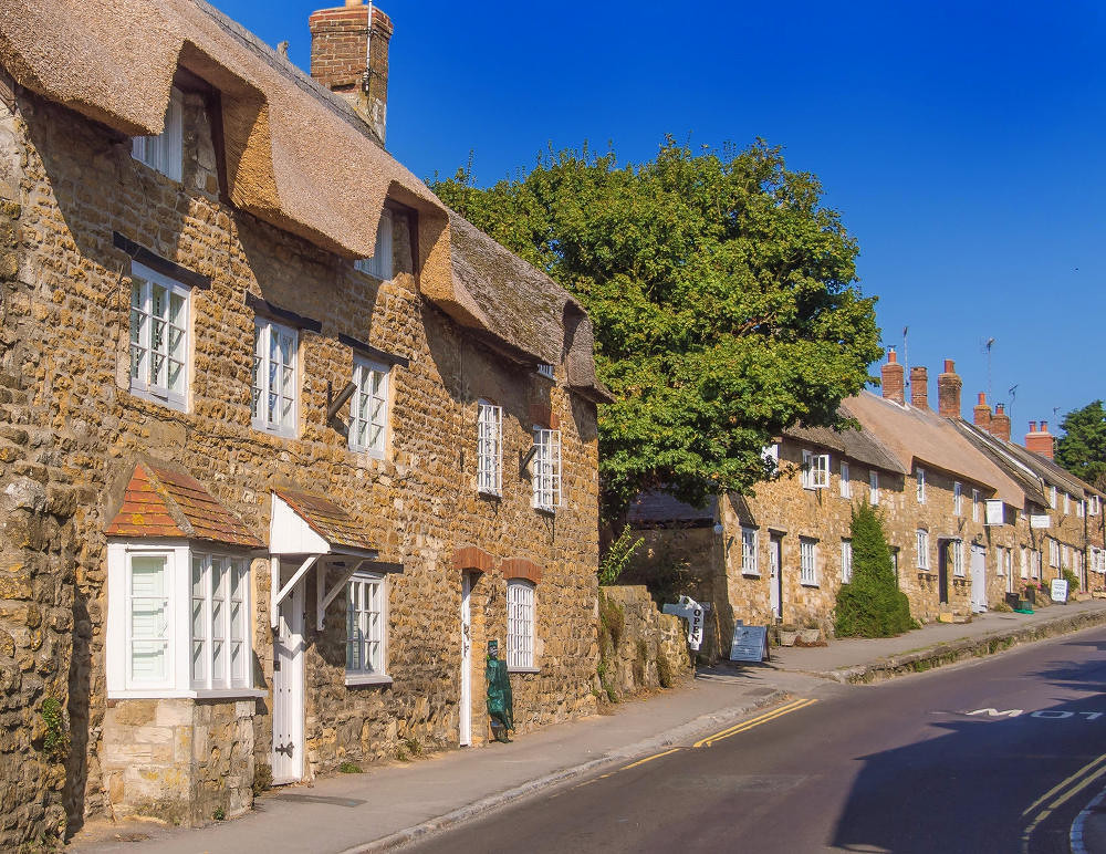 18th century cottages in Rodden Row at Abbotsbury, Dorset. Credit Anguskirk, flickr