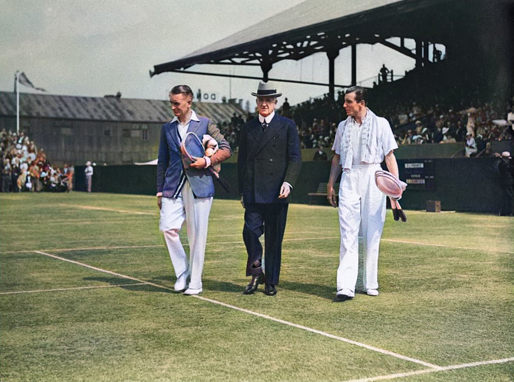 Australian tennis player Jack Crawford (left) and British tennis player Fred Perry (right) at the White City Stadium in Sydney, Australia with a senior tennis offical (center) 1930s