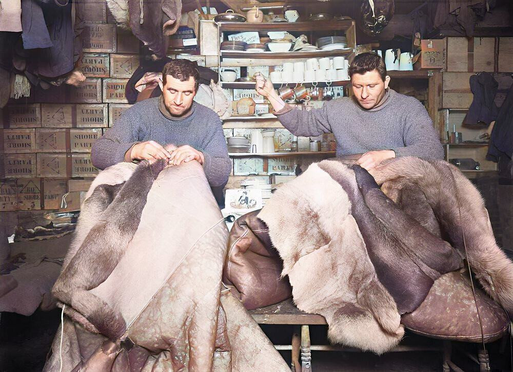 Petty officers Edgar Evans and Tom Crean mending sleeping bags. 16 May 1911