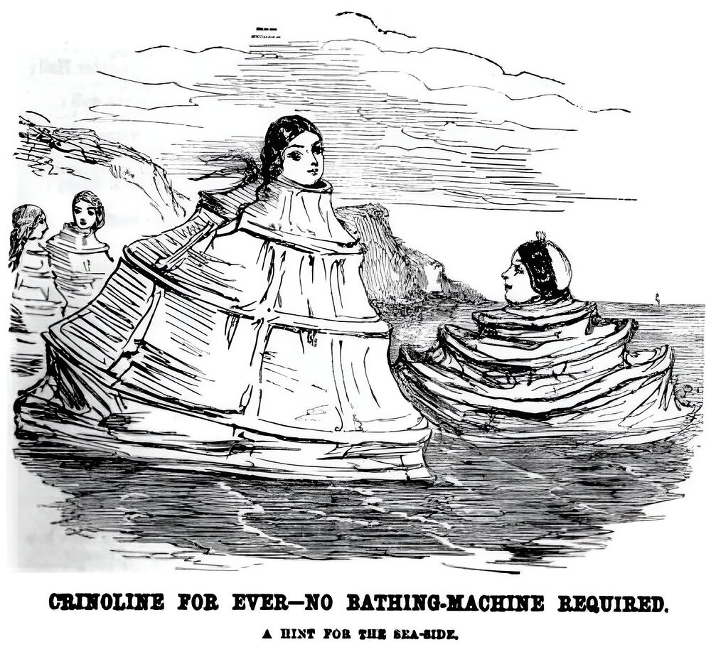 Two women are shown sea-bathing while wearing crinoline petticoats around their necks as a substitute for bathing tents