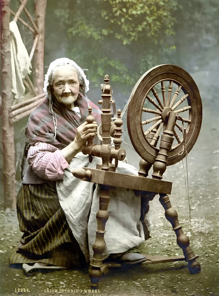 Irish spinner and spinning wheel. County Galway, Ireland