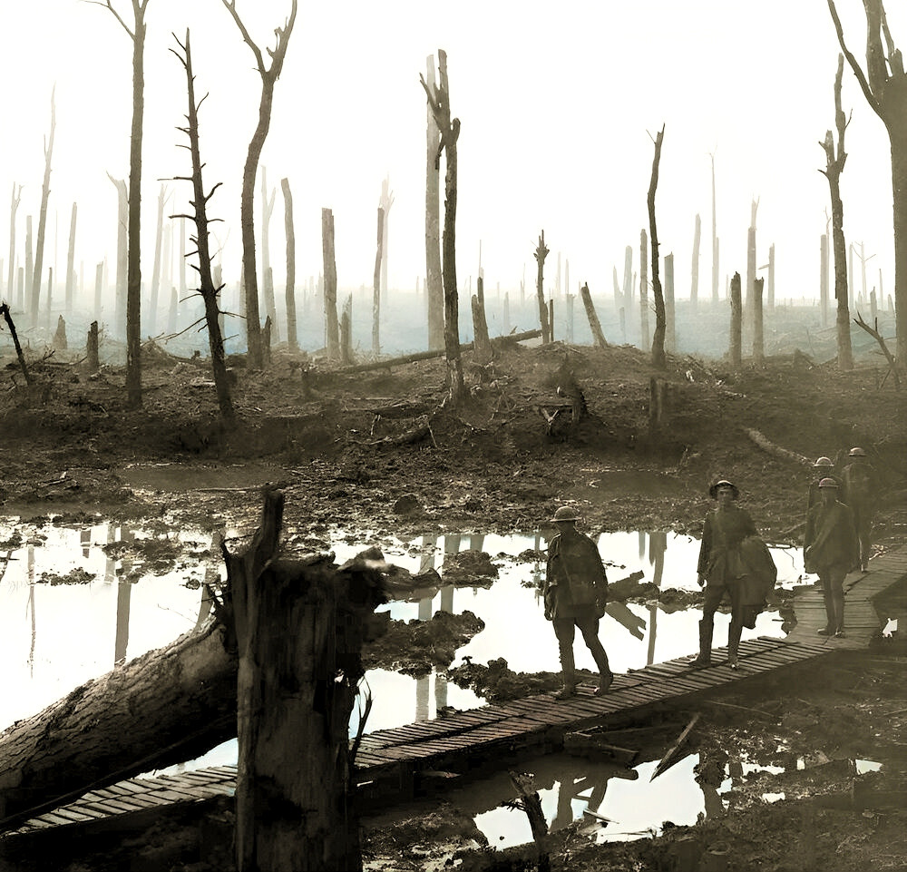 Soldiers of an Australian 4th Division field artillery brigade on a duckboard track passing through Chateau Wood, near Hooge in the Ypres salient, 29 October 1917
